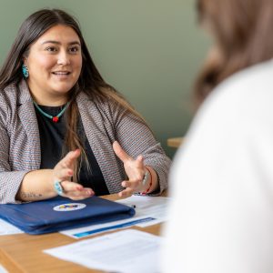 Photo of Career advisor meeting with a student.